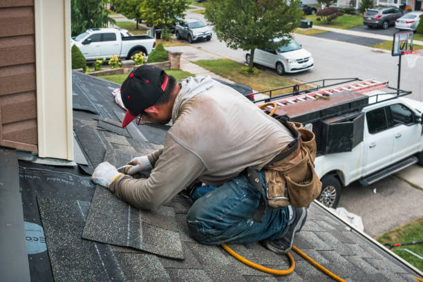Professional Emergency Roof Repair technician working in Mainland, PA
